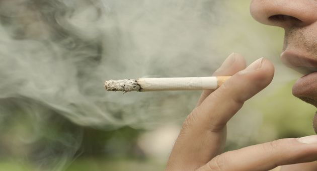Image of smoke from cigarettes: major reason of bone degeneration