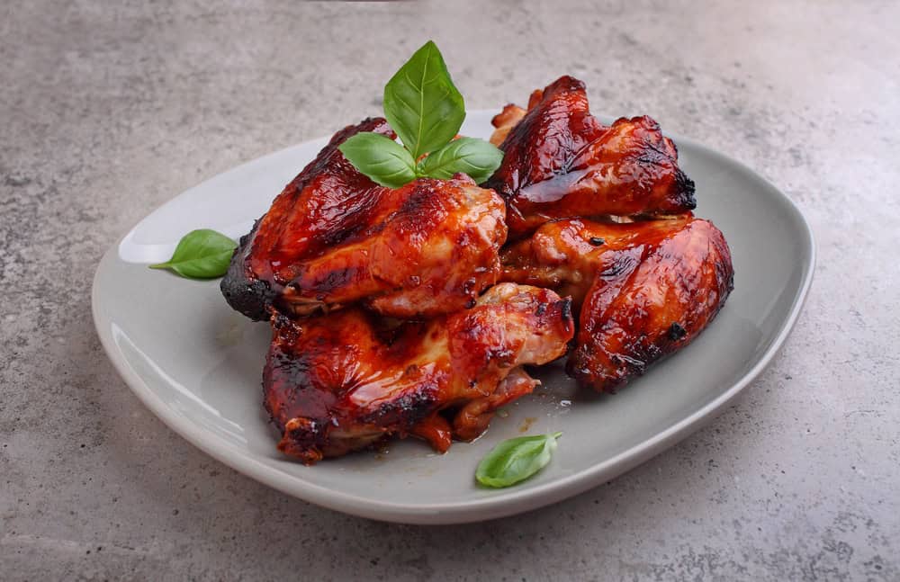 Grilled,Chicken,Wings,In,Soy,Sauce,Decorated,With,Basil,In