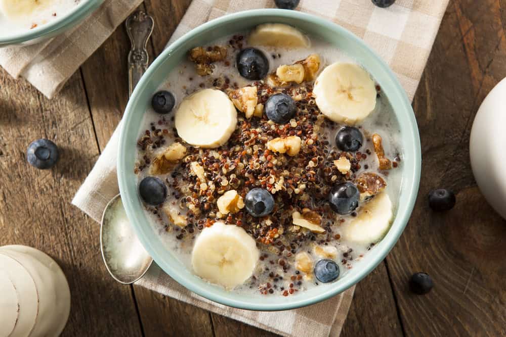 Organic,Breakfast,Quinoa,With,Nuts,Milk,And,Berries