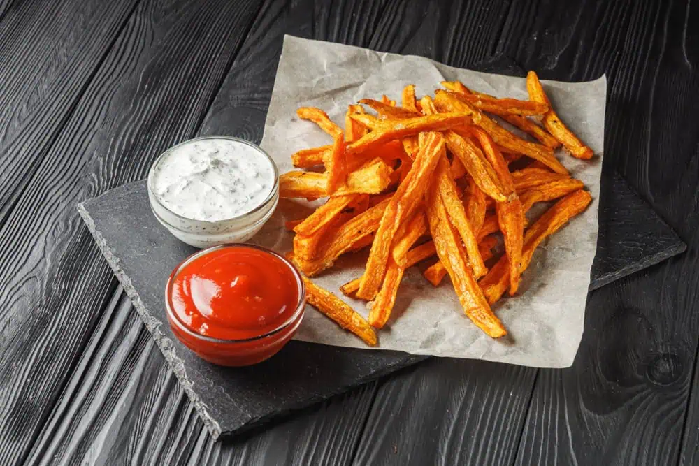 Sweet,Potato,Fries,On,A,Dark,Wooden,Rustic,Background.