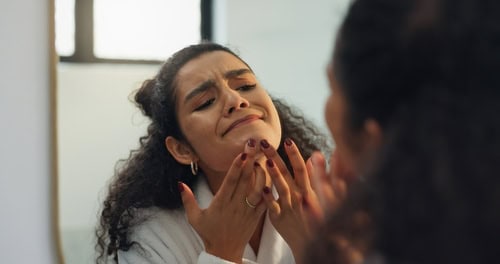 Woman,,Mirror,And,Pimple,For,Skincare,In,Bathroom,For,Acne,