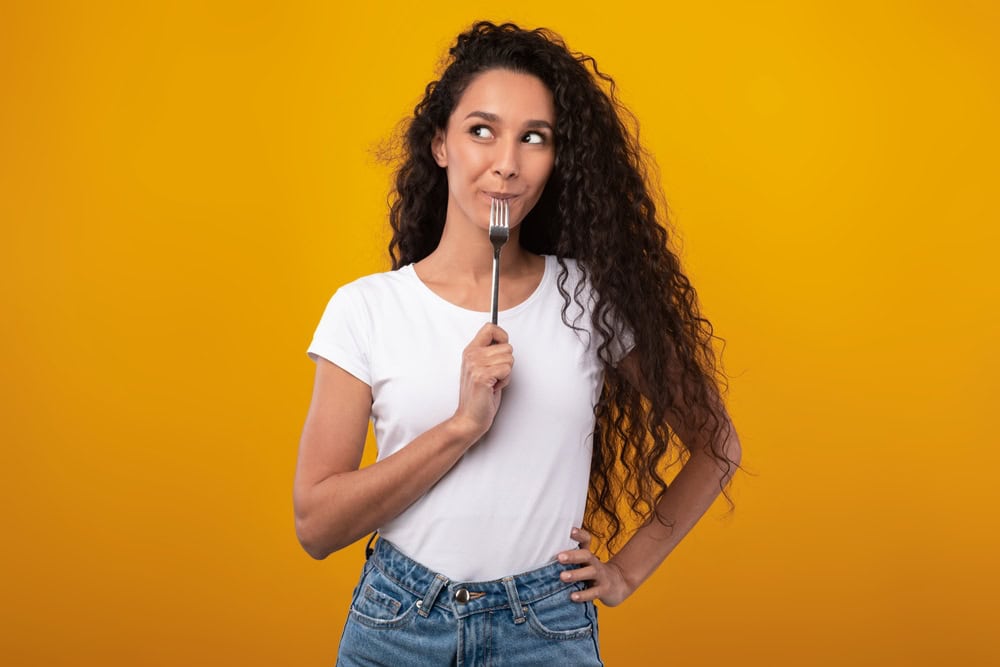 Portrait,Of,Excited,Hungry,Young,Woman,Holding,Fork,In,Her